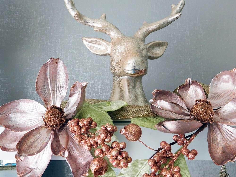 The blush deer was a bargain find but added show stopping results to my Christmas kitchen decor