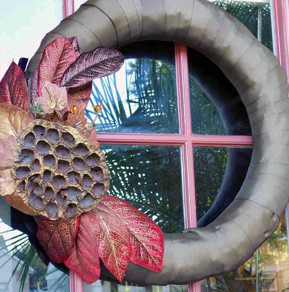 brown, gold and burgundy wreath with lotus pod